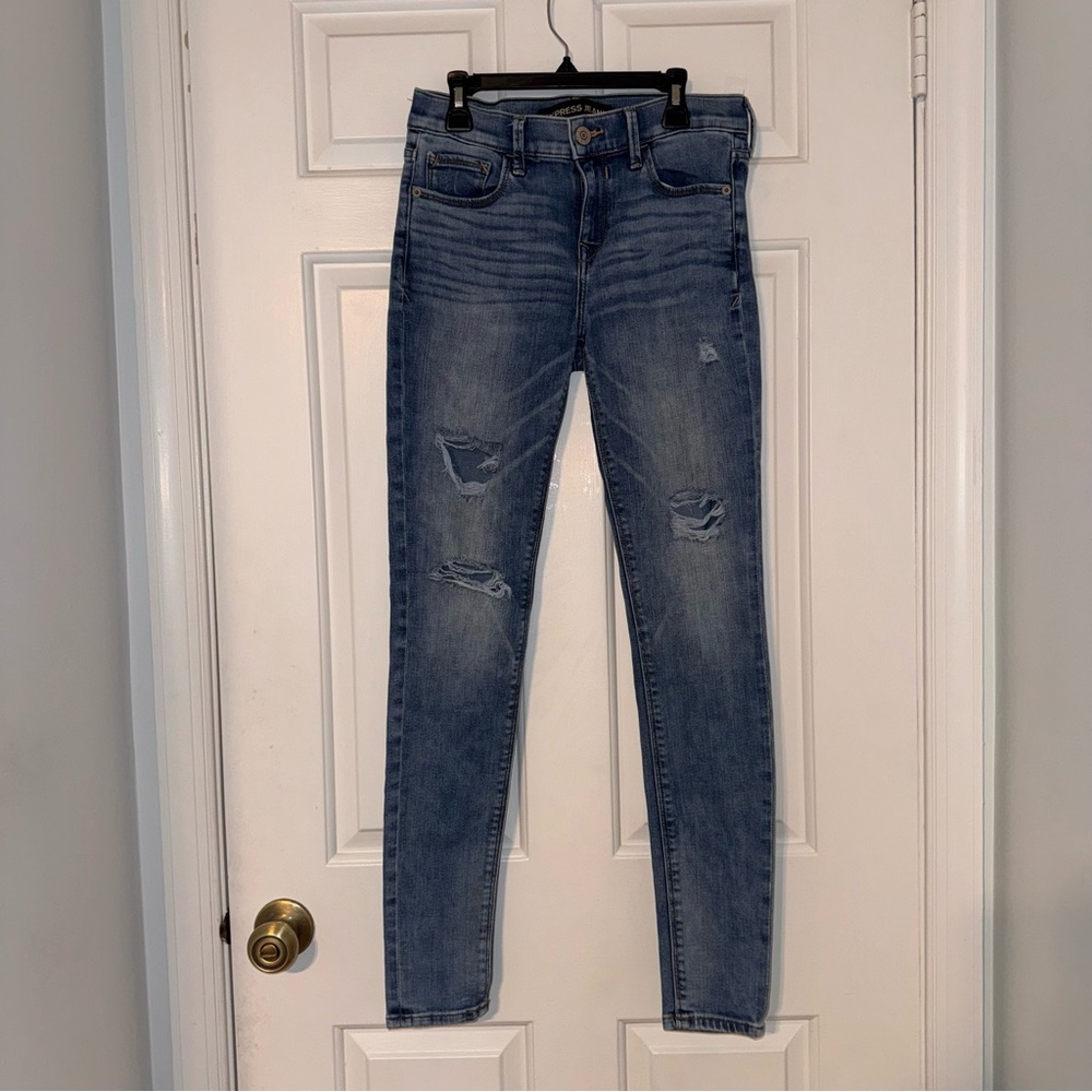 Express Jeans medium blue classic mid rise leggings distressed whiskered faded 2
